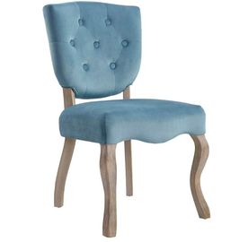 Un buen precio. Las sillas del comedor de los muebles antiguos abotonan la tela azul copetuda del lino del color en línea